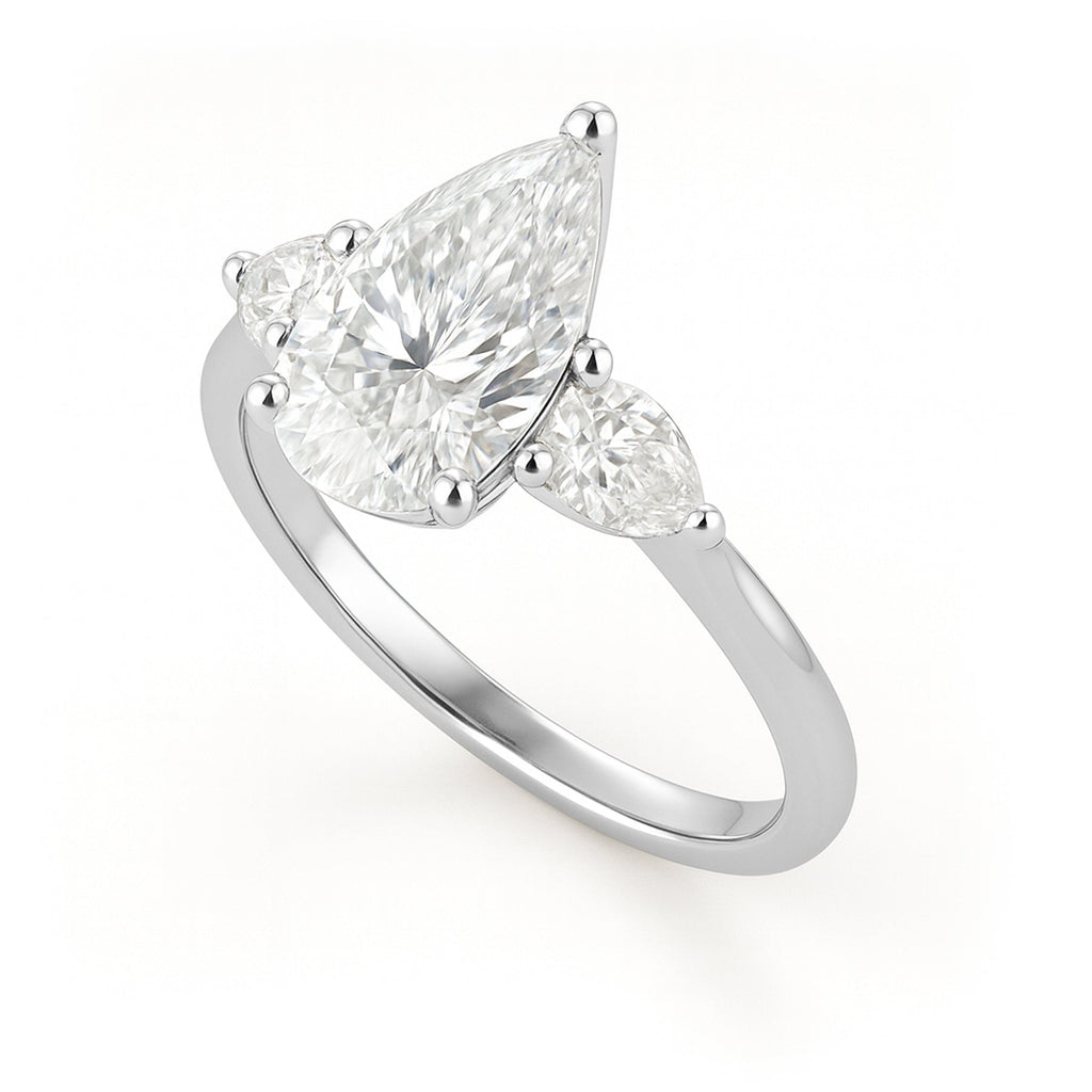 1.10 Ct Pear Moissanite Three-Stone Engagement Ring
