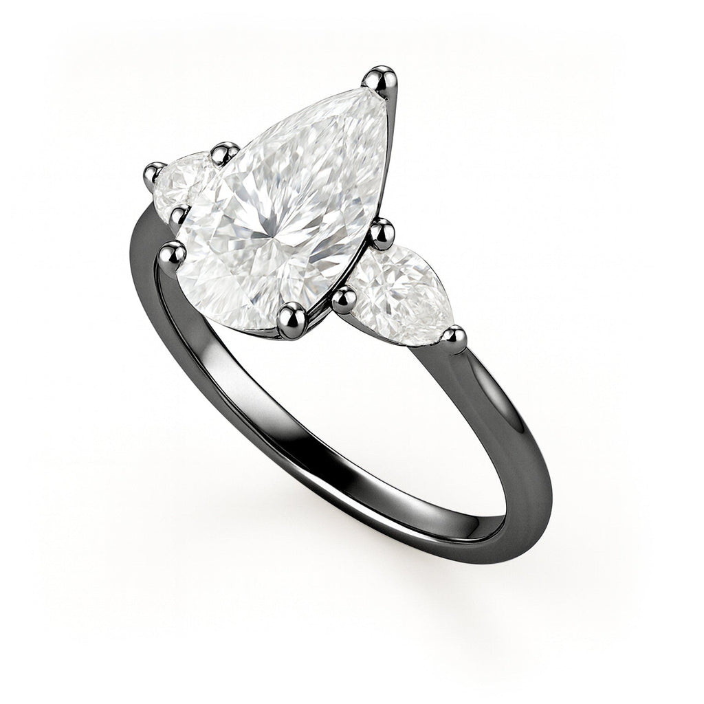 1.10 Ct Pear Moissanite Three-Stone Engagement Ring