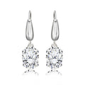 Elegant 2 Carat Oval Cut Moissanite Dangle Earrings in 18K White Gold over Silver