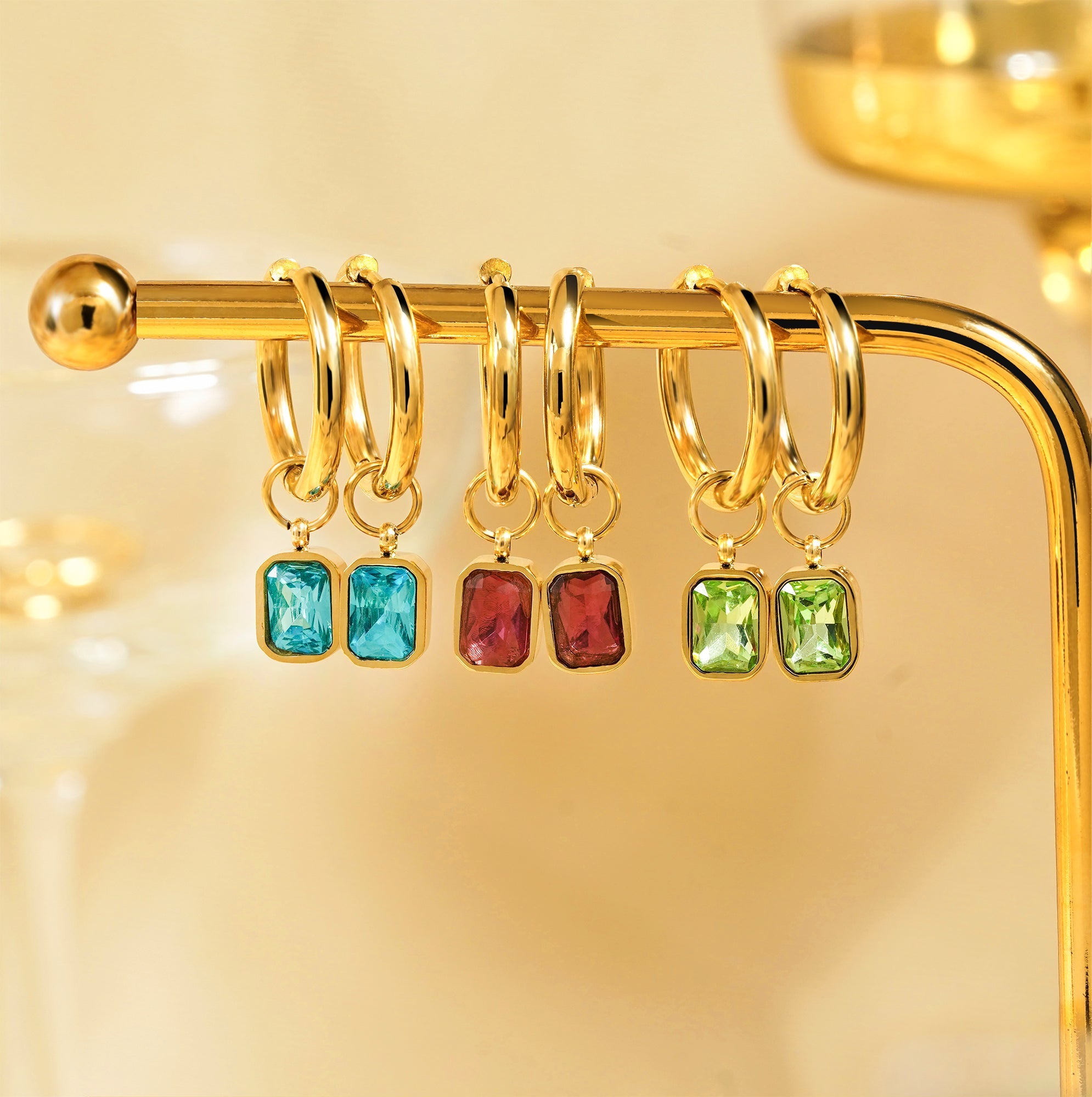 2 Carat Emerald Cut - Blue Topaz - December Birthstone Bezel Huggie Hoop Earrings - 18K Yellow Gold Plating