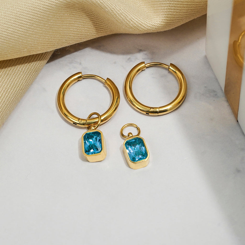 2 Carat Emerald Cut - Blue Topaz - December Birthstone Bezel Huggie Hoop Earrings - 18K Yellow Gold Plating