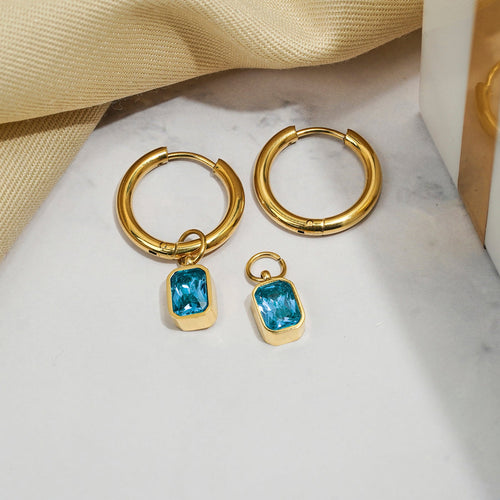 2 Carat Emerald Cut - Blue Topaz - December Birthstone Bezel Huggie Hoop Earrings - 18K Yellow Gold Plating