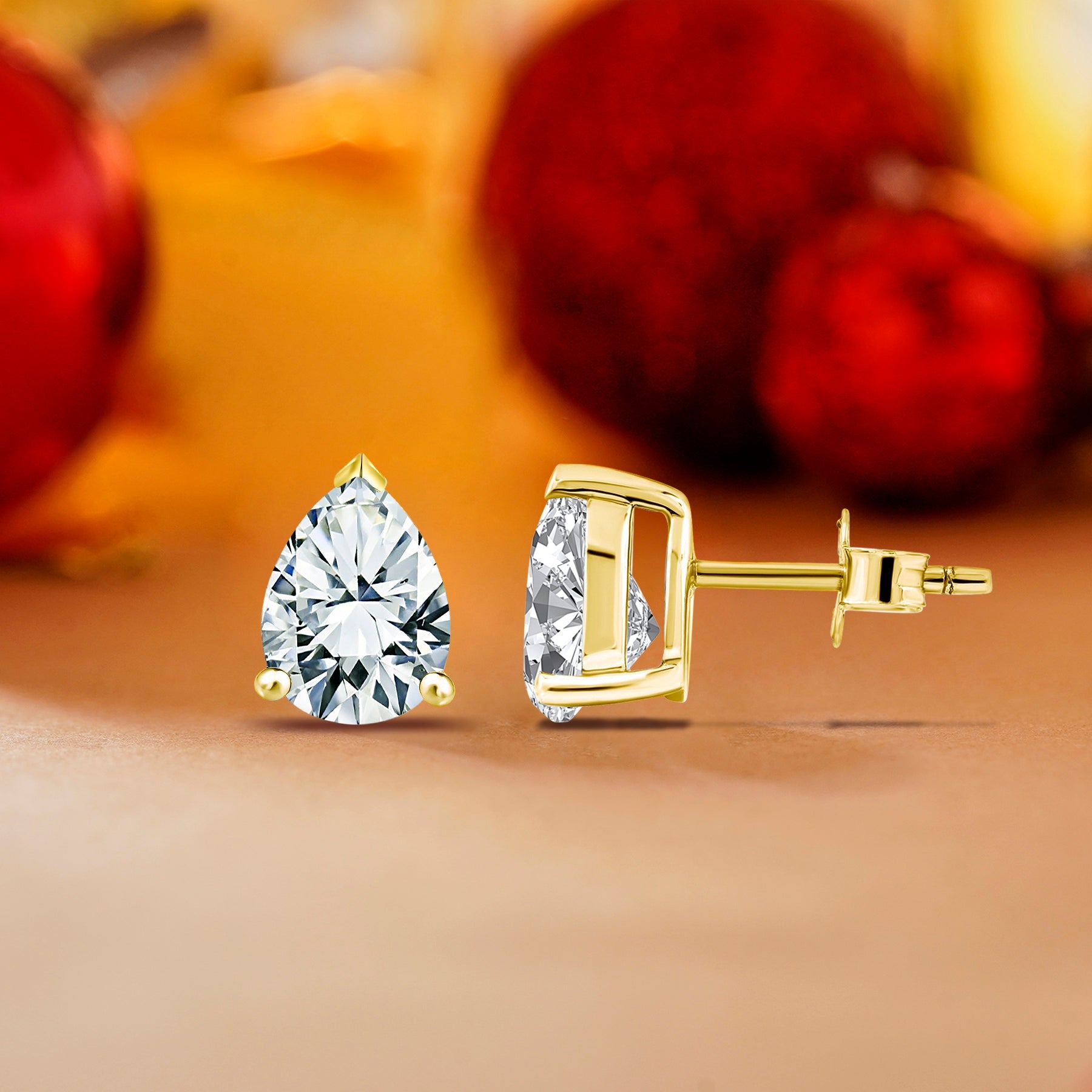 Minimalist 2 Carat Pear Cut Moissanite Solitaire Stud Earrings In 18K Yellow Gold Plating Over Silver