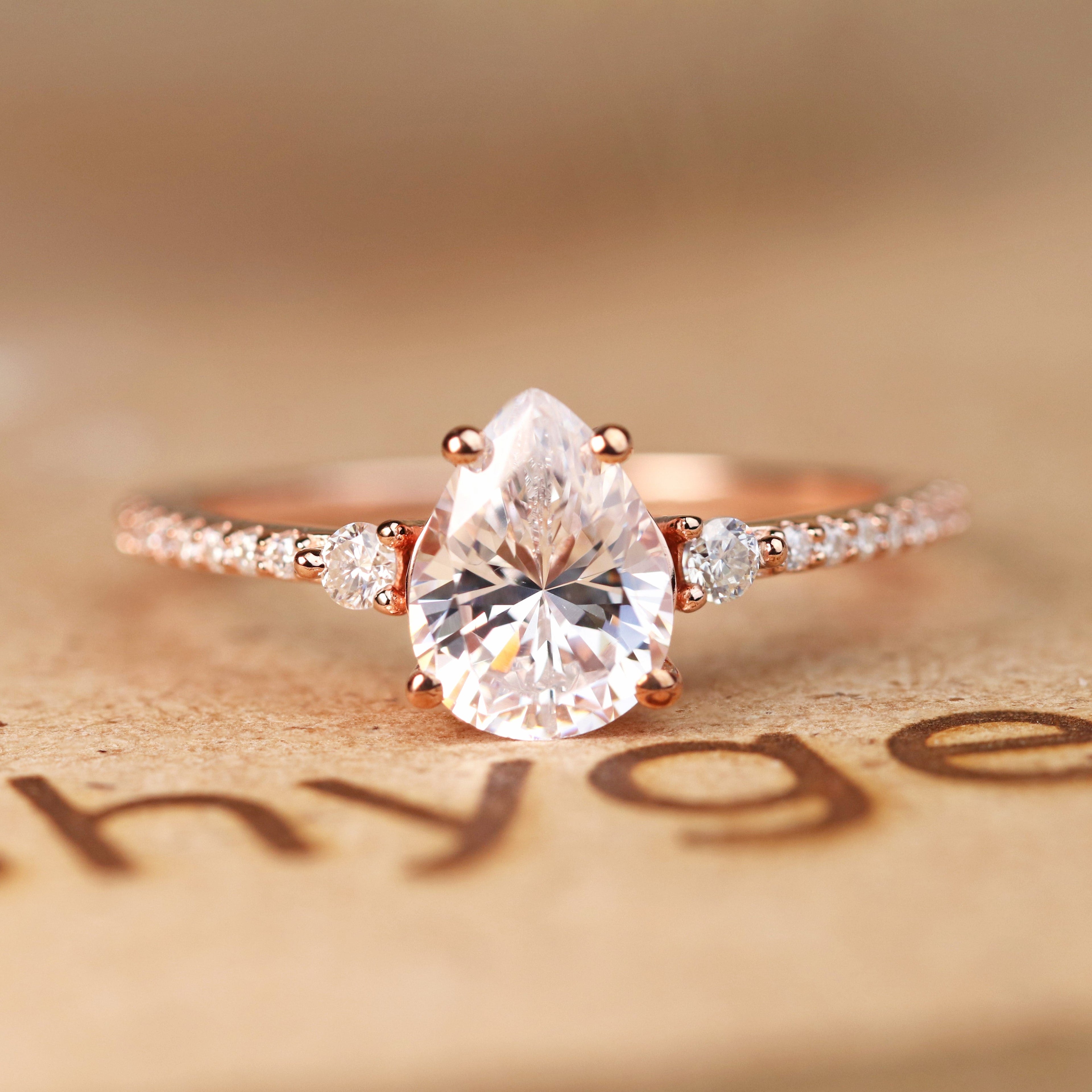 Pave Set 1.50 Carat Pear Moissanite Engagement Ring