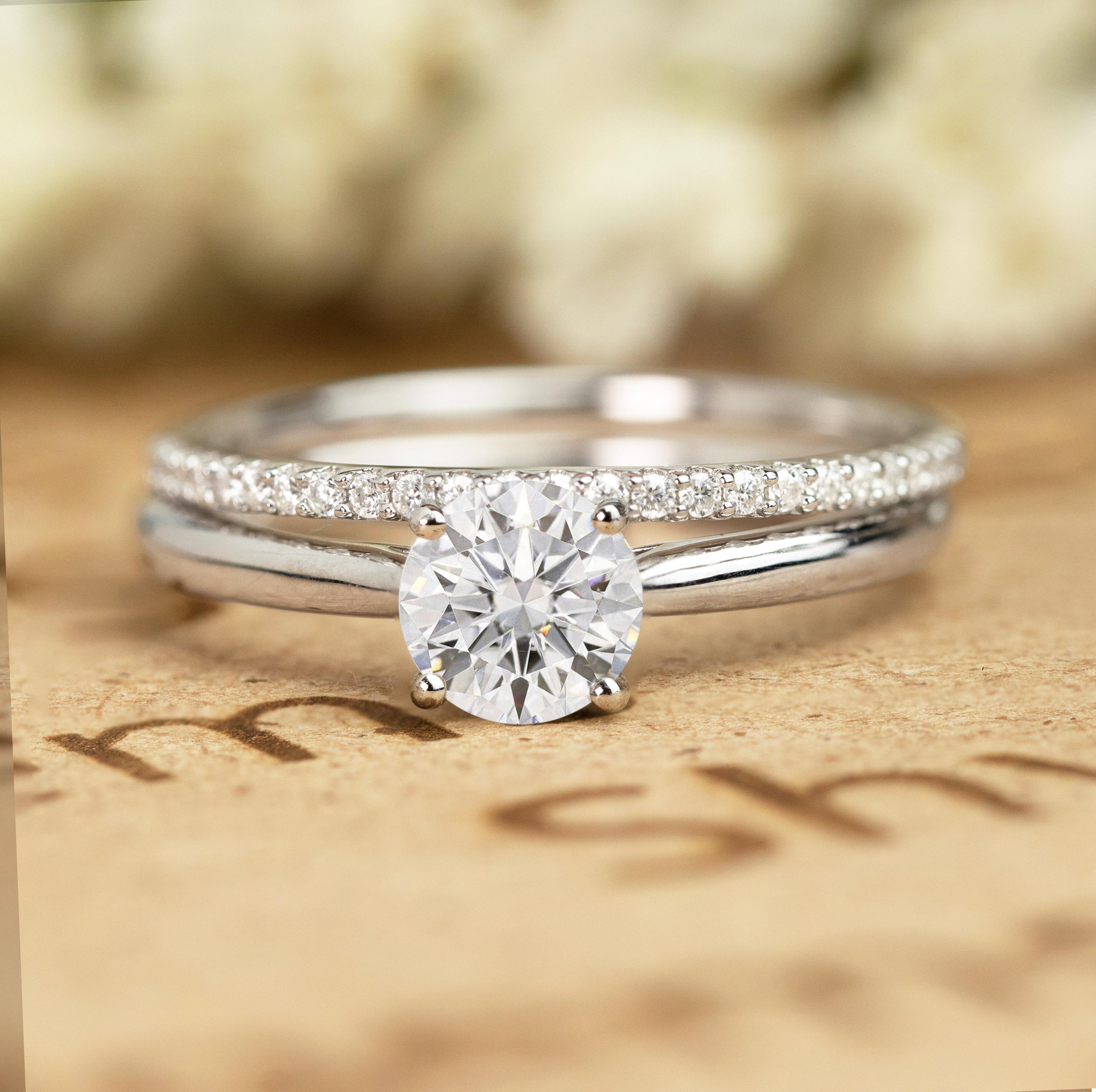 Four Prong 1.25 Carat Round Cut Moissanite Bridal Set