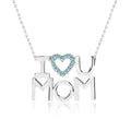 JeenMata I Love U Mom Light Blue Stone Embellished Open Heart Pendant Necklace in 18K White Gold over Silver - December Birthstone - Gift for Mom