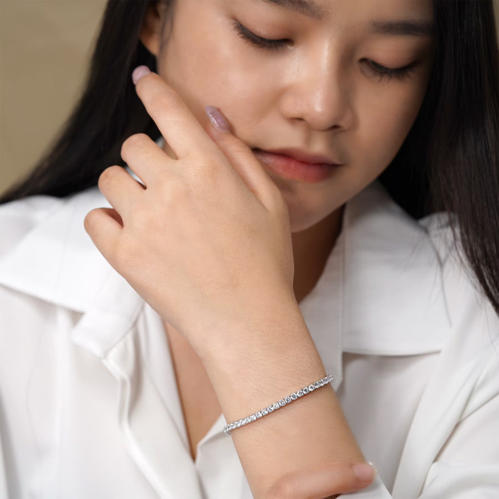 JeenMata Classic 5.5 TCW Round Cut Moissanite Tennis Bracelet Eternity Design in 18K White Gold over Silver