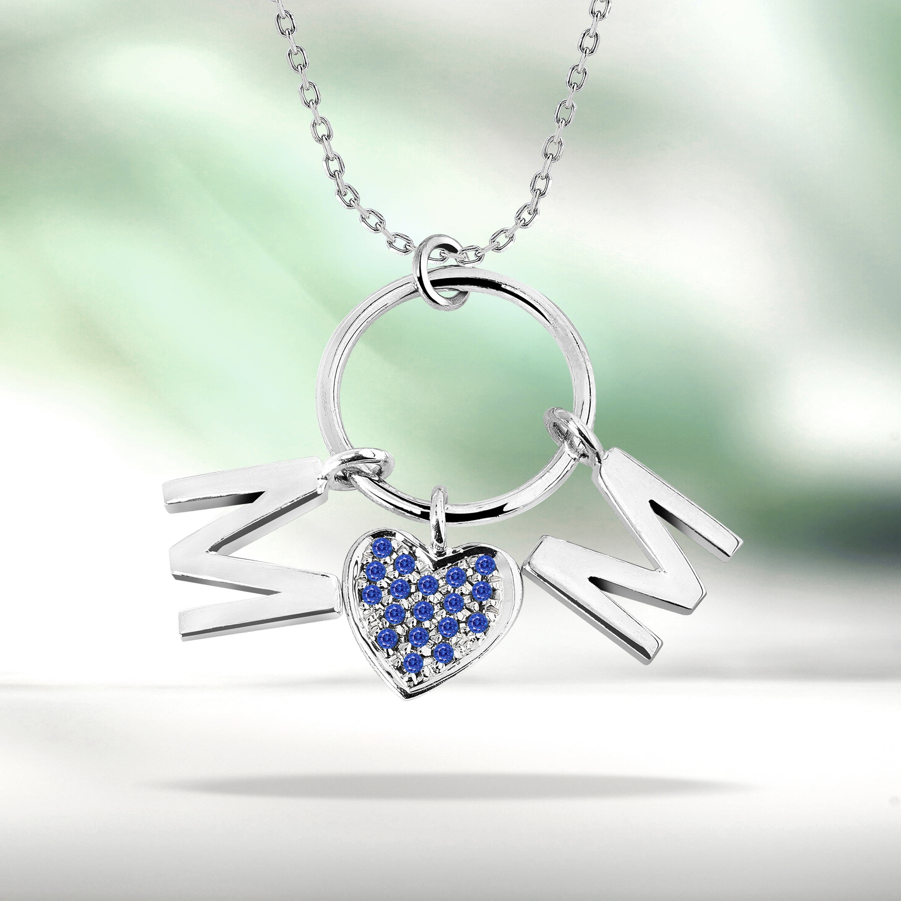 Circle Pendant with MOM Charms Pendant Necklace in 18K White Gold over Silver - Dark Blue Stone Embellished - September Birthstone